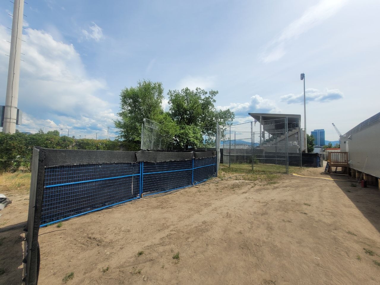 Perimeter route beside the Apple Bowl showing a fence-line path used for temporary event infrastructure