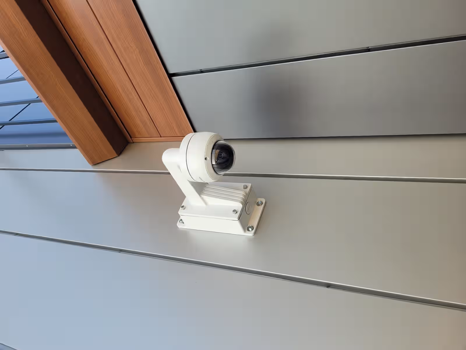 Wall-mounted security camera close-up